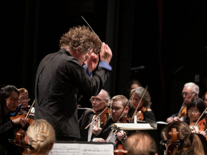 Maestro Michael Newnham conducting the Peterborough Symphony Orchestra during its "Romantik" concert on November 3, 2019. (Photo: Huw Morgan)