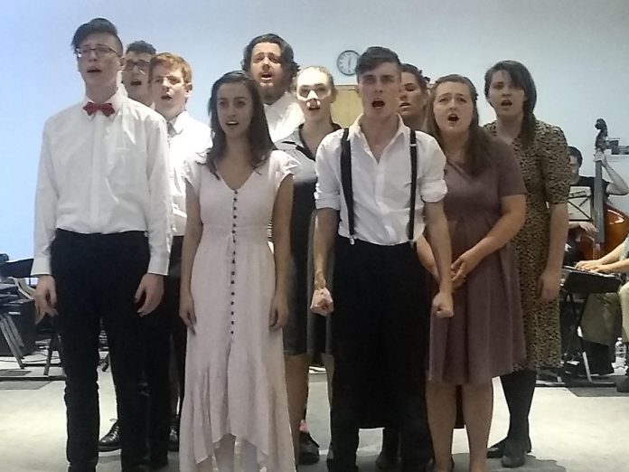 The cast of "Spring Awakening"  during a dress rehearsal at Catharine Parr Traill College: Drew Mills, Alessandra Ferrer,  and Kevin Lemieux (front row); Joseph Roper, Aimee Gordon, and Sarah Hancock (middle row); Carl Christensen, Rowan Lamoureux, Ryan Hancock, and Caitlin Currie (back row). The musical opens in Whitby on October 18th and 19th before coming to the Market Hall in downtown Peterborough from October 24th to 26th. (Photo: Sam Tweedle / kawarthaNOW.com)