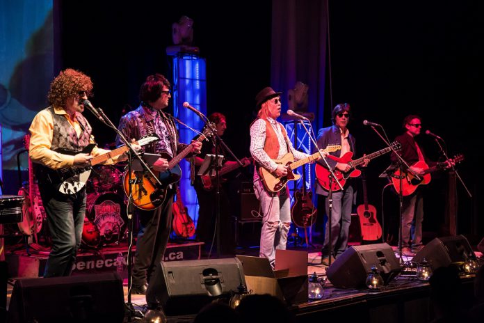 With members selected from the best tribute bands in Canada, The Traveling Milburys faithfully recreates the look and sound of supergroup The Traveling Wilburys, including members Jeff Lynne, Roy Orbison, Tom Petty, George Harrison, and Bob Dylan. The tribute band performs at Market Hall Performing Arts Centre in downtown Peterborough on November 29, 2019. (Photo: The Traveling Milburys)