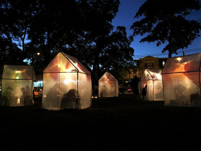 "Trophy" is a free outdoor art installation where audience members visit illuminated tents to listen as storytellers share their true stories of life-changing moments of change and transformation. Presented by Public Energy Performing Arts, "Trophy" takes place on October 4 and 5, 2019, at Fleming Park in downtown Peterborough. (Photo: Allison O'Connor)