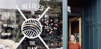 Needles in the Hay owner Deanna Guttman in front of her popular yarn shop at 385 Water Street in downtown Peterborough. The independent locally owned business, which celebrates its 10th anniversary in 2020, has everything for your knitting and crocheting needs, including free weekly instructional sessions. Needles in the Hay is offering several special promotions, beginning on Black Friday and running all weekend or until supplies last. (Photo: Amy E. LeClair)