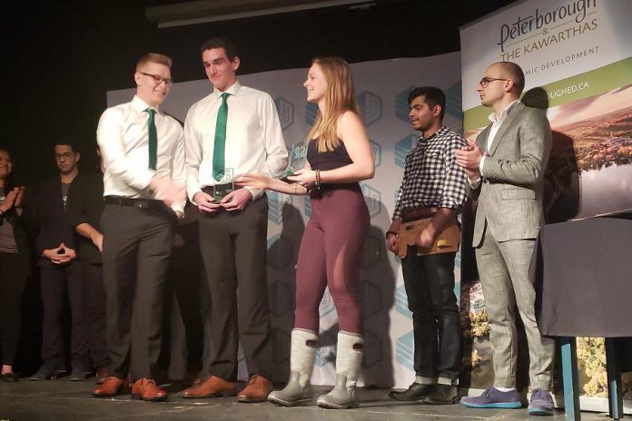 Runners up Shane Willis and Tanner Morrow of Eco-Care (left, in green ties) and Telsi Szanyi of Flow Codes. (Photo courtesy of Innovation Cluster)