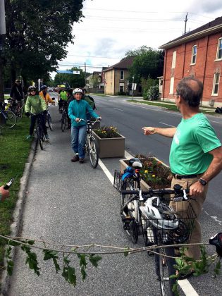 In 2017, the City of Peterborough installed a demonstration protected bike lane on George Street south of McDonnel, which showcased various options that can be used to create physical separation including bollards, curbs, and planters.  (Photo: GreenUP)