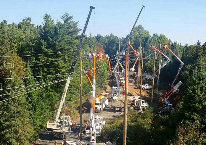 Hydro One crews installing smart switches on lines in the Bancroft and Barry's Bay area in September 2018. The smart switches help to reduce the frequency and duration of power outages while limiting the number of customers impacted. Hydro One will be installing four smart switches in Haliburton County and replacing 24 wooden poles during a planned power outsage on November 24, 2019. (Photo: Hydro One / Instagram)