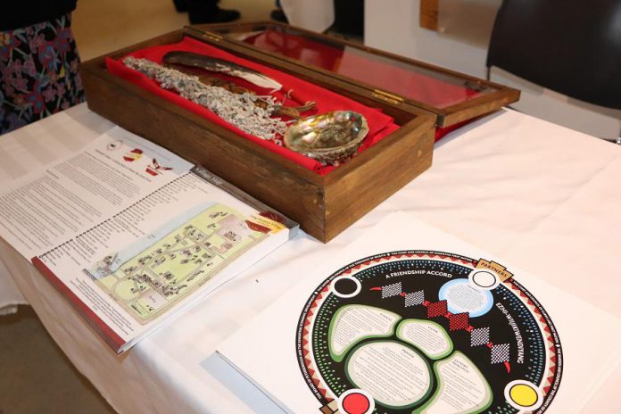 The Community Economic Development Incentive (CEDI) document on a table during the Friendship Accord Signing Ceremony between Curve Lake First Nation, Hiawatha First Nation, the County of Peterborough, Selwyn Township, Otonabee-South Monaghan Township and Peterborough & the Kawarthas Economic Development on Saturday, November 2nd at Lang Pioneer Village. (Photo: Cando)