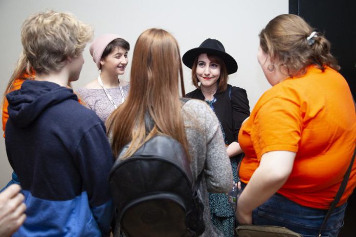 Filmmaker Slater Jewell-Kemker chats with high school students from the Youth Leadership in Sustainability program following the opening night screening of "Youth Unstoppable" at the 2019 ReFrame Film Festival. (Photo: Natelie Herault)