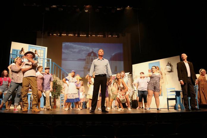 Natalie Dorsett as Donna (front, far left) with Mark Gray as Bill, Warren Sweeting as Sam, and Keevin Carter as Harry in the St. James Players production of the hit musical "Mamma Mia!". (Photo: Wendy Morgan)