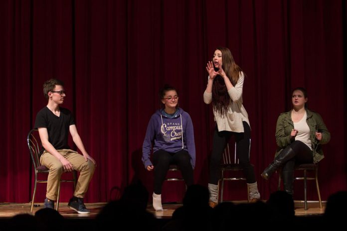 The Time Fillers improv troupe, featuring Zac Houghton, Taylor Gauthier, Ashton Kelly, and Grace Arnold, performing  at Storm the Stage in 2015. (Photo courtesy of Enter Stage Right)