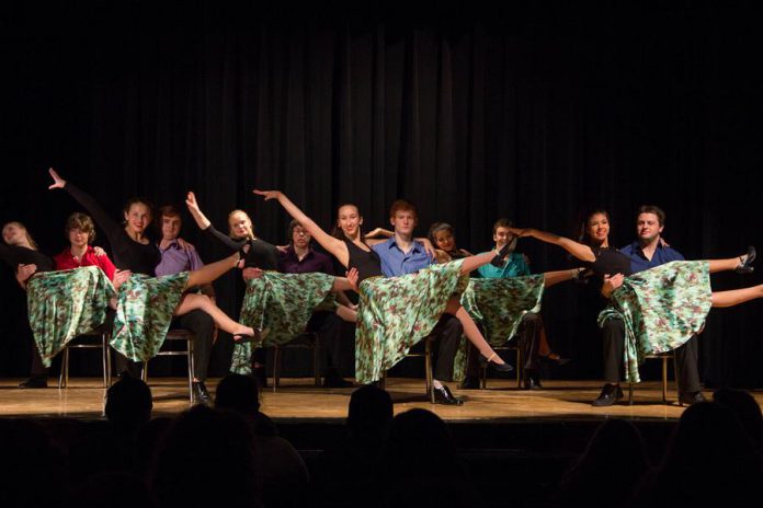 Storm the Stage is an annual arts showcase, hosted by local theatre company Enter Stage Right, that features performances from secondary students in the Peterborough and surrounding area. The event, which takes place on November 29, 2019 at the PCVS Auditorium in downtown Peterborough, boasts acts such as singing, dancing, instrumental music, and spoken word, and displays student works of art, photography, and sculpture. Pictured is students in the Kenner Dance Program performing a salsa-inspired partner routine to Chayanne's "Salomé" at Storm the Stage in 2015. (Photo courtesy of Enter Stage Right)