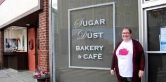 Rose Wilton, founder of The Rose Project, in front of Sugar Dust Bakery on Walton Street in Port Hope where you can donate toiletries or warm gloves, mittens, and hats for people in need. You can also bring donations to The Rose Project's inaugural Holiday Craft Show at the Town Park Recreation Centre on November 23, 2019, which features vendors offering a selection of hand-crafted items for your holiday shopping. (Photo: April Potter / kawarthaNOW.com)