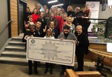 Members of collective philanthropy group 100 Women Peterborough present their donation of more than $10,000 to Lakefield Animal Welfare Society in the lobby of the VentureNorth building in downtown Peterborough on December 17, 2019. The "no-kill" animal shelter was selected by members to receive the donation from the group, which has now raised around $100,000 for eight local charities. (Photo courtesy of 100 Women Peterborough)