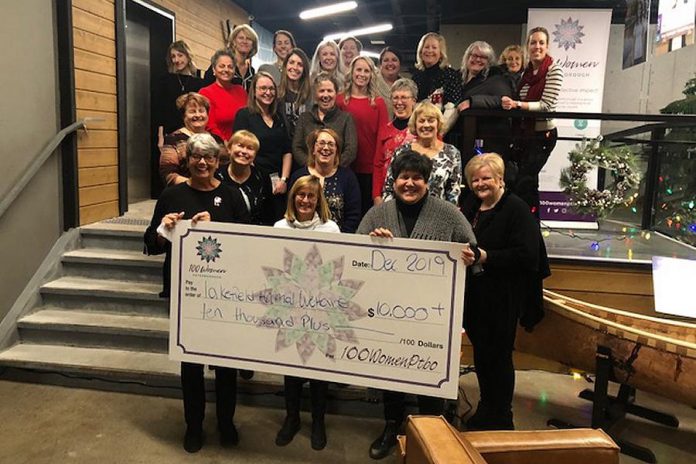 Members of collective philanthropy group 100 Women Peterborough present their donation of more than $10,000 to Lakefield Animal Welfare Society in the lobby of the VentureNorth building in downtown Peterborough on December 17, 2019. The "no-kill" animal shelter was selected by members to receive the donation from the group, which has now raised around $100,000 for eight local charities. (Photo courtesy of 100 Women Peterborough)