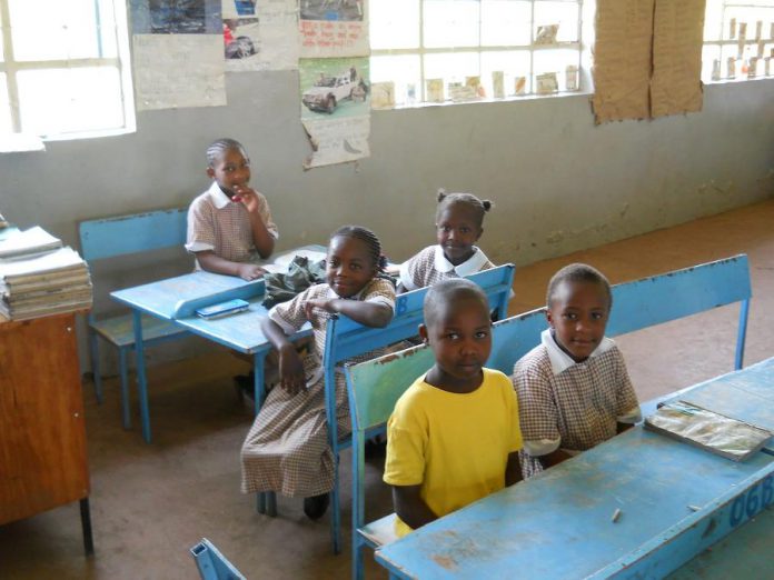 Students at Hungerpillar School in Liberia, West Africa, where families must pay for their children's education. As well as sponsoring students who otherwise wouldn't be able to attend school, Humanwave raises funds to pay the wages of teachers, who often choose to work for free when schools are unable to pay them. (Supplied photo)