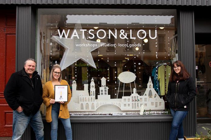 Watson & Lou co-owner Erin Watson (second from left) with the first place award for the annual Peterborough DBIA Holiday Decorated Window Contest. Also pictured is DBIA executive director Terry Guiel and DBIA intern and contest coordinator Olivia Boughen. (Photo courtesy of Peterborough DBIA)