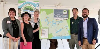 Our look back at business and organizational news in 2019 in Peterborough and the Kawarthas includes this past summer's launch of the Trent-Severn Trail Town program, Canada's first waterway "trail town" program that links communities along the Trent-Severn Waterway (including Campbellford, Hastings, Lakefield, Buckhorn, Lindsay, Bobcaygeon, Fenelon Falls, Coboconk, and Rosedale) to encourage regional tourism and support local business. Pictured at the August 22nd launch at Ranney Falls (Locks 11-12) in Campbellford (from left to right): Cycle Forward founder and trail town consultant Amy Camp, Northumberland-Peterborough South MP Kim Rudd, Kawarthas Northumberland/Regional Tourism Organization 8 (RTO8) Executive Director Brenda Wood, Parks Canada Associate Director for Ontario Waterways Dwight Blythe, and Northumberland-Peterborough South MPP David Piccini. (Photo courtesy of RTO8)