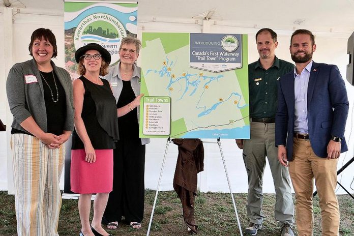 Our look back at business and organizational news in 2019 in Peterborough and the Kawarthas includes this past summer's launch of the Trent-Severn Trail Town program, Canada's first waterway "trail town" program that links communities along the Trent-Severn Waterway (including Campbellford, Hastings, Lakefield, Buckhorn, Lindsay, Bobcaygeon, Fenelon Falls, Coboconk, and Rosedale) to encourage regional tourism and support local business. Pictured at the August 22nd launch at Ranney Falls (Locks 11-12) in Campbellford (from left to right): Cycle Forward founder and trail town consultant Amy Camp, Northumberland-Peterborough South MP Kim Rudd, Kawarthas Northumberland/Regional Tourism Organization 8 (RTO8) Executive Director Brenda Wood, Parks Canada Associate Director for Ontario Waterways Dwight Blythe, and Northumberland-Peterborough South MPP David Piccini. (Photo courtesy of RTO8)