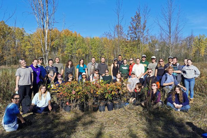 Fleming College students preparing to plant trees and shrubs. (Photo courtesy of Kawartha Land Trust)