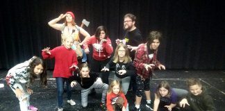 A few of the nearly 50 cast members of Arbor Theatre's original production "Real Rad Red Riding Hood", with a public performance on December 12, 2019 at Showplace Performance Centre in downtown Peterborough. Pictured at a rehearsal in early December are Naomi DuVall as The Forester, Nathan Bertucci as Basher, Aidan Shaughnessy as the Big Bad Wolf, with Ella Smit, Izzy Desjardins, Saffron O'Neil, Logan Michaelis, Saorse MacQuarrie, Molly Beaston, and Zoe Dunaway as the wolf cubs and Riordan MacQuarrie as Mouse. (Photo: Sam Tweedle / kawarthaNOW.com)