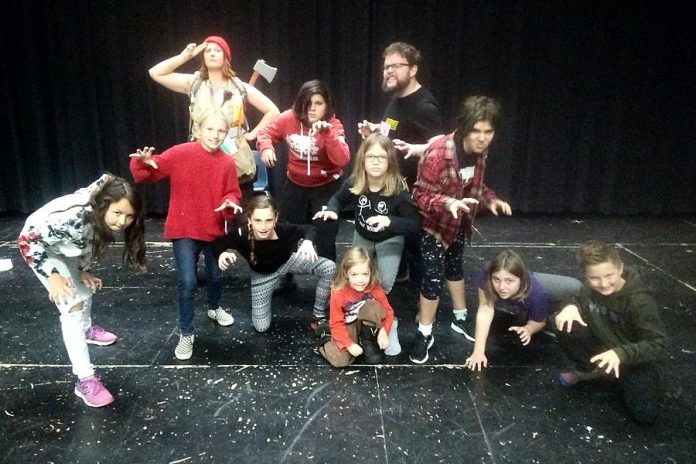 A few of the nearly 50 cast members of Arbor Theatre's original production "Real Rad Red Riding Hood", with a public performance on December 12, 2019 at Showplace Performance Centre in downtown Peterborough. Pictured at a rehearsal in early December are Naomi DuVall as The Forester, Nathan Bertucci as Basher, Aidan Shaughnessy as the Big Bad Wolf, with Ella Smit, Izzy Desjardins, Saffron O'Neil, Logan Michaelis, Saorse MacQuarrie, Molly Beaston, and Zoe Dunaway as the wolf cubs and Riordan MacQuarrie as Mouse. (Photo: Sam Tweedle / kawarthaNOW.com)