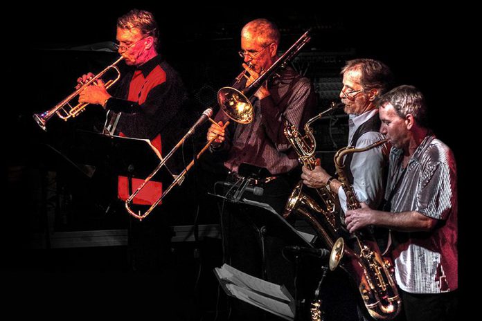 Rhythm and blues ensemble The Rocket Revue will perform at Market Hall Performing Arts Centre in downtown Peterborough on December 28, 2019. The 20th anniversary concert, dedicated to the late Buzz Thompson, will feature rhythm section Bobby Watson on gutiar, JP Hovercraft on bass, Rob Phillips on keyboards, and John Climenhage on drums, horn section Greg Weichel on trumpet, Jim Usher on tenor saxophone, Steve McCracken on tenor/baritone saxophone, and Rob Roy on trombone, and special guest performers Ryan Weber, Sam Weber, Marcus Browne, Jerome Godboo, Bridget Foley, and Jane Archer. (Photo: The Rocket Revue)