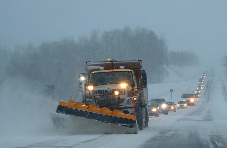 Winter storm watch in effect for southern Kawarthas region for Wednesday Snow plow on highway during snow squall