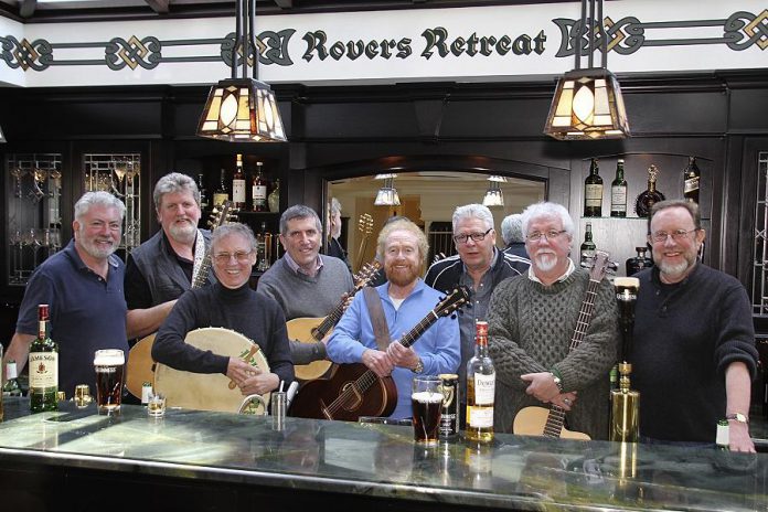 George Millar (fifth from left) is the only remaining original member of The Irish Rovers, the iconic band he founded with the late Jimmy Ferguson in Toronto in 1963. Along with George Millar, the band's current members are Sean O'Driscoll, Ian Millar, Gerry O'Connor, Morris Crum, Fred Graham, Geoffrey Kelly, and Davey Walker.  (Photo: Hamish Burgess)