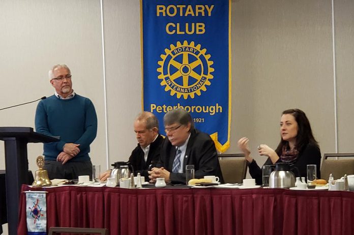 Peterborough Mayor Diane Therrien (right) spoke at the Rotary Club of Peterborough meeting at the Holiday Inn on January 27, 2020, along with Peterborough County Warden J. Murray Jones (second from right). Also pictured are Rotarians Jay Amer (at the podium) and Kevin Duguay. (Photo: Jeannine Taylor / kawarthaNOW.com)