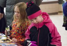 Young readers check out the books on display at last year's annual Family Literacy Day in Peterborough Square. This year's Saturday morning event, with the theme "Once Upon A Turtle", takes place on January 25, 2020 in the lower level of in Peterborough Square. It features children's author Andrew Larsen, Plugging Into Nature music and puppet show, a live turtle exhibit by Ontario Turtle Conservation Centre, Celebrity Readers' Theatre, and face painting. Admission is free and every child leaves with a free book. (Photo courtesy of Peter Rellinger)