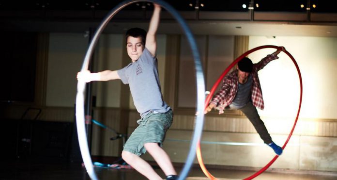 Ethan performing on the cyr wheel in "Circus Boy", a film about family dynamics by LA Alfonso. (Photo: LA Alfonso)
