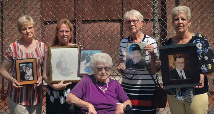 Aileen Hughes (seated) was the first widow to go public after her husband Morris, a GE employee, was diagnosed with mesothelioma. In "Town of Widows", a documentary by  Rob Viscardis and Natasha Luckhardt, Aileen recalls her husband coming home from work covered with asbestos. (Photo: Rob Viscardis)