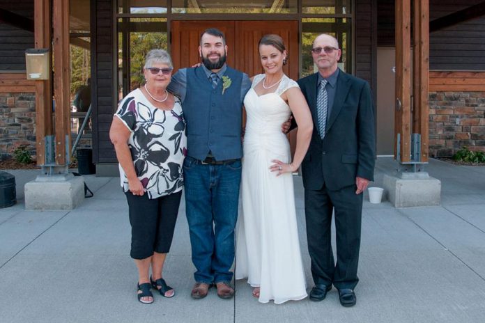 Wade Hartin and his wife Emily with Wade's parents Mary and Brad at the couple's wedding.  Wade was killed in an accident on January 14, 2020 while working working at his job as a snow grooming machine operator at Dagmar Ski Resort near Uxbridge. Emily is due to give birth to the couple's first child in April, and a GoFundMe campaign has been set up to support Emily and Baby Hartin.   (Photo supplied by Ashley Webster)