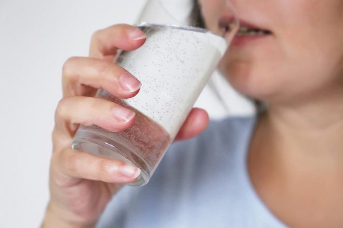 Woman drinking a glass of water