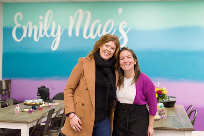 Emily Mae's Cookies & Sweets owner Jennifer Wight (right) with Madeleine Hurrell, entrepreneurship officer at Peterborough & the Kawarthas Economic Development's Business Advisory Centre. Hurrell oversees the Starter Company Plus program, which awarded Wight a $4,000 grant in 2017 to help build her business. Wight held the grand opening of her brick-and-mortar shop at 1135 Lansdowne Street West in Peterborough on February 1, 2020. (Photo: Peterborough & the Kawarthas Economic Development / Facebook)