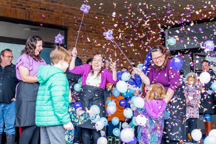 Emily Mae's Cookies & Sweets owner Jennifer Wight (fourth from left) celebrates the grand opening of her brick-and-mortar shop at 1135 Lansdowne Street West in Peterborough on February 1, 2020. (Photo: Peterborough & the Kawarthas Economic Development / Facebook)