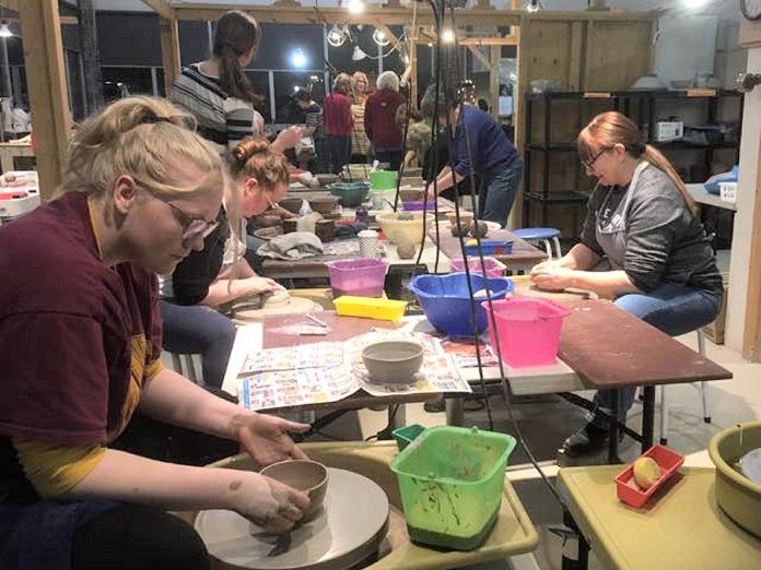 Members of the Kawartha Potters Guild came together in January to make more than 115 wheel-thrown and hand-built bowls for the annual YWCA Empty Bowls fundraiser. The Kawartha Woodturners Guild and Artisans Centre Peterborough have also donated hand-crafted bowls for the event, which takes place at 12 p.m. on February 28, 2020 at  The Venue in downtown Peterborough. (Photo:  Kawartha Potters Guild / Facebook)