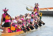 Paddlers at the 2015 Peterborough's Dragon Boat Festival, which returns to Del Crary Park in Peterborough for its 20th year on Saturday, June 13th. To date, the annual event has raised more than $3.6 million for for breast cancer screening, diagnosis, and treatment at Peterborough Regional Health Centre. (Photo: Linda McIlwain / kawarthaNOW.com)