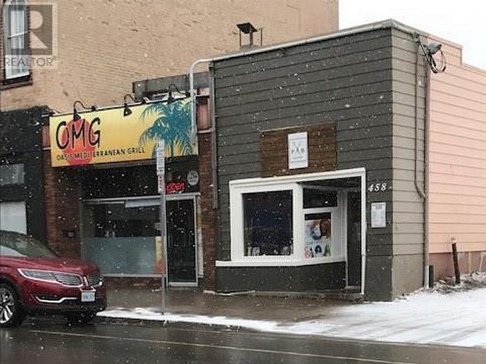 The buildings at 458-460 George Street North, currently occupied by Fab Factory Hair Studio and OMG Oasis Mediterranean Grill, are also part of the $1.7 million listing along with the former Pig's Ear Tavern building at 144 Brock Street. (Photo: REALTOR.ca)