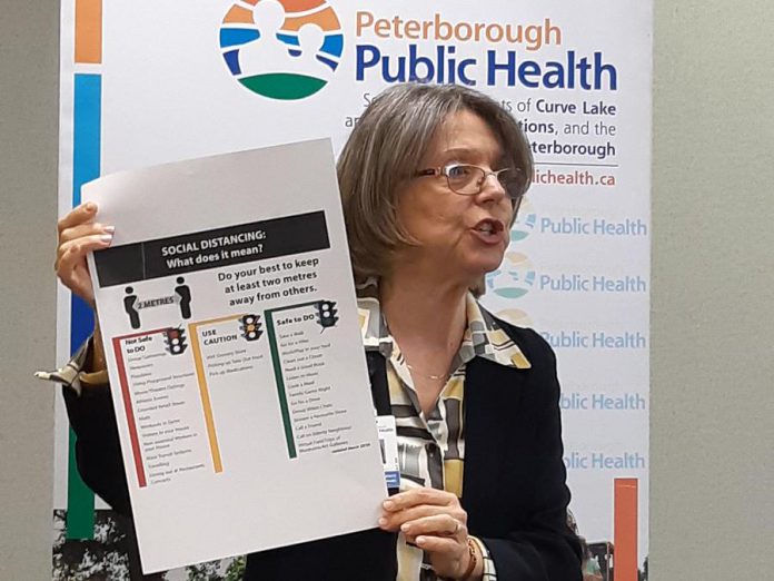 Medical officer of health Dr. Rosana Salvaterra emphasizing the importance of physical distancing during a media briefing at Peterborough Public Health on March 23, 2020. (Photo: Peterborough Public Health)