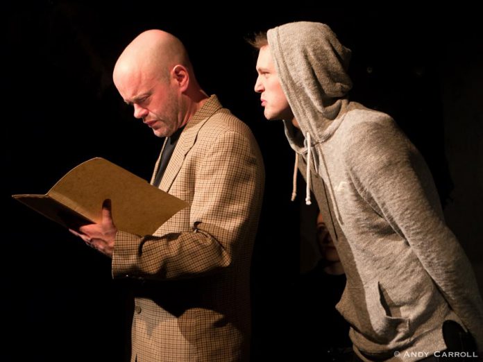 In The Theatre on King's production of "Equus", Dan Smith performs as psychiatrist Dr. Martin Dysart with Conner Clarkin as his disturbed young patient Alan Strang. (Photo: Andy Carroll)