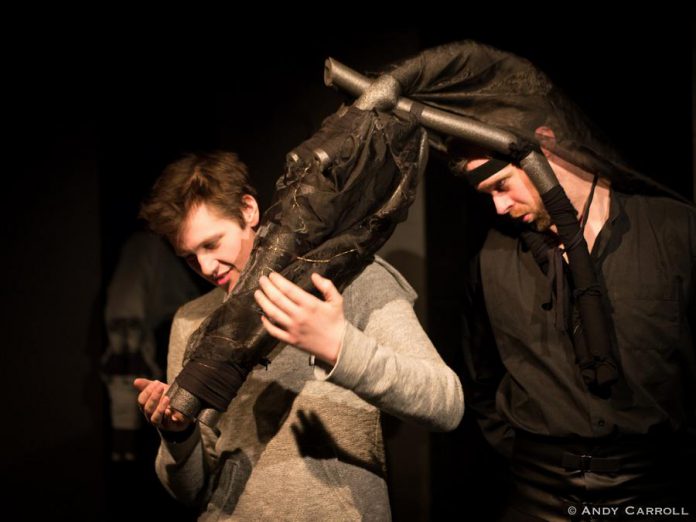 Conner Clarkin as Alan Strang with Derek Bell as Nugget, a horse with which Alan as an erotic fixation. The horse heads were designed by Ann Jaeger with set and costumes by Kate Story. (Photo: Andy Carroll)