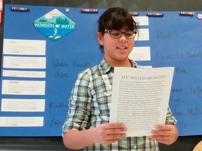 During last year's celebration of World Water Day, Agnieszka shares her favourite water memory with her fellow grade five classmates at Monsignor O'Donoghue in Peterborough as part of GreenUP's Wonders of Water program. GreenUP's new H2O To Go kits were created as part of that program. (Photo: Karen O'Krafka)