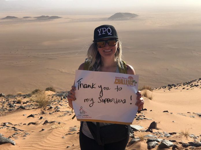 Linz Hunt of Royal LePage Frank Real Estate in Peterborough in the Sahara Desert in November 2019, when she trekked 100 kilometres along with 120 Royal LePage professionals to raise funds for women's shelters and and domestic violence prevention and education programs across Canada. Hunt raised $17,820 in support of YWCA Crossroads Shelter. (Supplied photo)