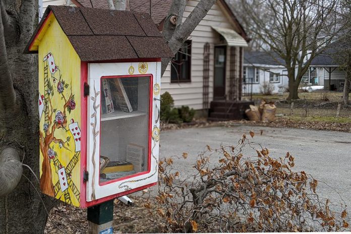 In 2015, the Rotary Club of Peterborough installed 25 little libraries in the Peterborough area, such as this one on Maria Street in Peterborough's East City. Now some little libraries are replacing books with free essential food and household care items. (Photo: Bruce Head / kawarthaNOW.com0