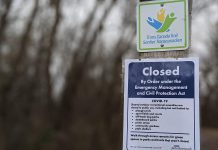 A closure notice posted by the City of Peterborough at the entrance to Ecology Park in Peterborough. On March 30, 2020, the Ontario government issued a new emergency order under the Emergency Management and Civil Protection Act to close all outdoor recreational amenities, such as sports fields and playgrounds, effective immediately. (Photo: Bruce Head / kawarthaNOW.com)