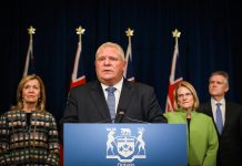 Ontario premier Doug Ford announces a state of emergency for the province due to the COVID-19 pandemic at Queen's Park on March 17, 2020. Also pictured are Health Minister Christine Elliott, Ontario Solicitor General Sylvia Jones, and Finance Minister Rod Phillips. (Photo: Government of Ontario)