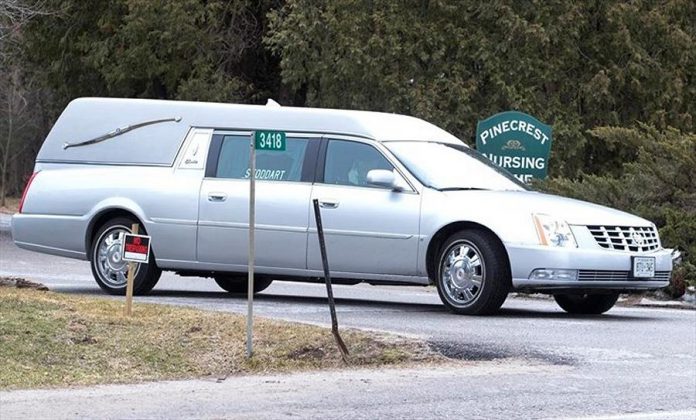 A hearse departs Pinecrest Nursing Home in Bobcaygeon, Ontario on Tuesday, March 31, 2020. (Photo: Fred Thornhill / The Canadian Press)