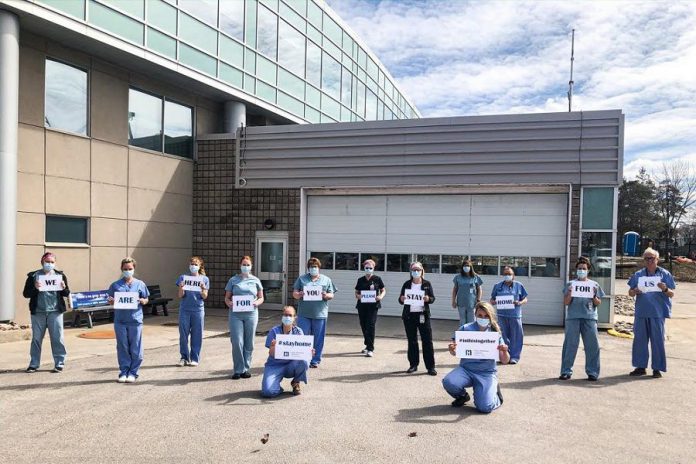 The emergency dapartment team at Ross Memorial Hospital in Lindsay with a message for the community: "We are here for you, please stay home for us." (Photo courtesy of Ross Memorial Hospital)