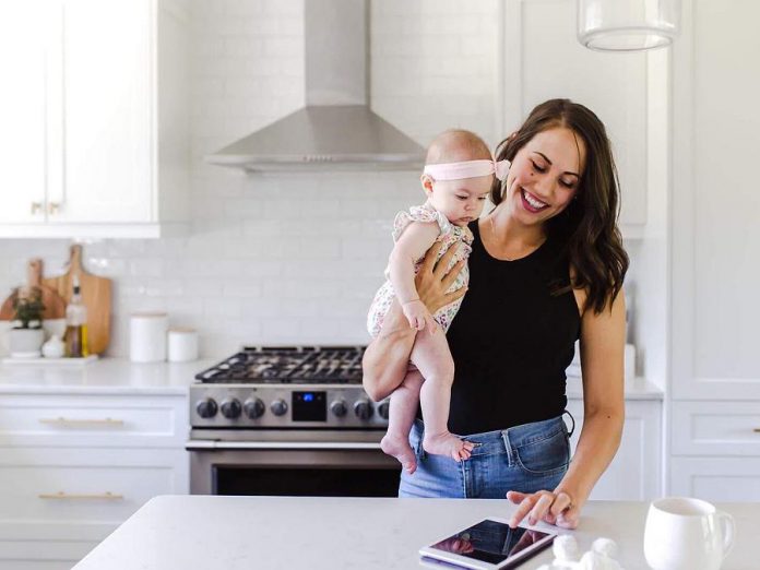 Pilates on Demand owner and CEO Jessica Dalliday with her daughter Rachel working remotely from home. (Photo courtesy of Innovation Cluster)