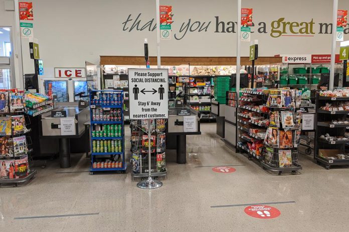 Every other check-out lane is closed so that customers can keep their distance in two dimensions. (Photo: Bruce Head / kawarthaNOW.com)