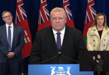 On April 3, 2020, a sombre Premier Doug Ford, accompanied by Ontario's Chief Medical Officer of Health Dr. David Williams and Deputy Premier and Minister of Health Christine Elliott, announnced new emergency meaures to prevent the spread of COVID-19 in Ontario, following the release of projections that Ontario will have 80,000 positive COVID-19 cases and 1,600 deaths by the end of April. (Photo: Office of the Premier / YouTube)